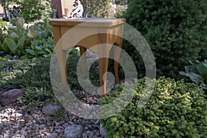 Homemade wood stool against the backdrop of nature