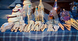 Homemade wooden spoons at a market