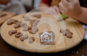 Homemade Xmas cookie for Christmas and Happy New Year. Cooking gingerbread with friend and Family on winter holiday