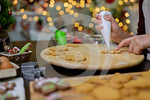 Homemade Xmas cookie for Christmas and Happy New Year. Cooking gingerbread with friend and Family on winter holiday