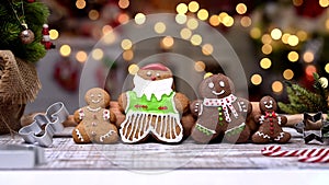 Homemade Xmas cookie for Christmas and Happy New Year. Woman cooking gingerbread with friend and Family on winter holiday