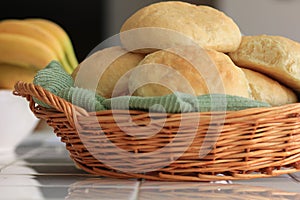 Homemade yeast bread rolls in a basket