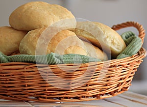 Homemade yeast bread rolls in a basket