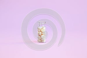 Homeopathic globules and glass bottle on pink background. Alternative Homeopathy