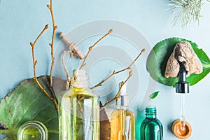 Homeopathic oils, dietary supplements for intestinal health Natural cosmetics, oils for skin care on a light background.