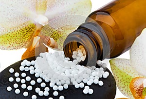 Homeopathy. Globules as alternative medicine photo