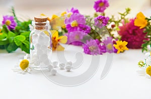 Homeopathy. Herbal extracts in small bottles. Selective focus