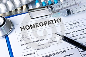 HOMEOPATHY - A homeopathy concept with homeopathic medicine Ho