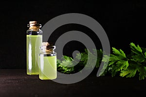 Homeopathy oil in vintage bottles black background. A bottle of homeopathic remedies.