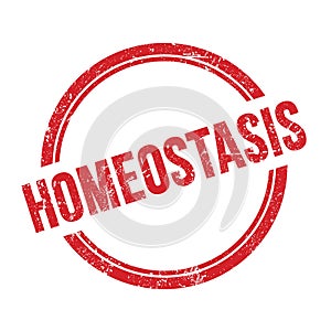 HOMEOSTASIS text written on red grungy round stamp photo