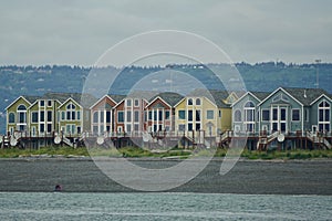 Homer, Alaska: A row of colorful houses at the tip of Homer Spit, in Kachemak Bay. photo