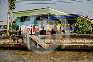 Homes along the Chao Phraya River in Bangkok Thailand.