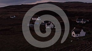 Homes and Cottages along the coast of the Isle of Skye, Aerial view at sunset