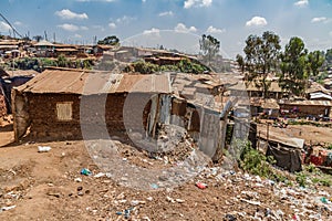 Homes in Kibera slum with garbage