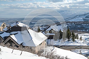 Homes on mountain neighborhood with panoramic views of the valley and lake