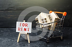 Homes in a shopping cart and for rent easel. Real estate realtor services. Legal procedure for concluding a contract. Investment