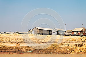 Homes on stilts on the floating village of Kampong Phluk, Tonle Sap lake, Siem Reap province, Cambodia