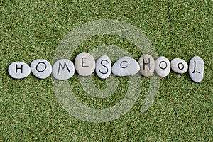 Homeschool written in pebbles on artificial grass