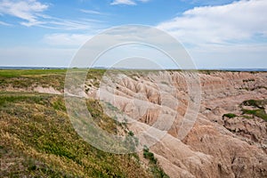 Homestead Overlook in Badland national park during summer. From grassland to valley. Badland landscape