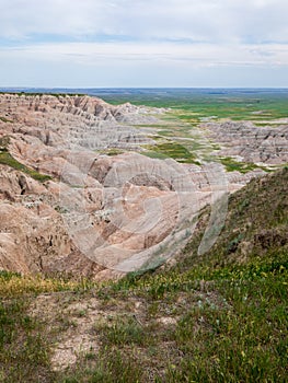 Homestead Overlook in Badland national park during summer. From grassland to valley. Badland landscape