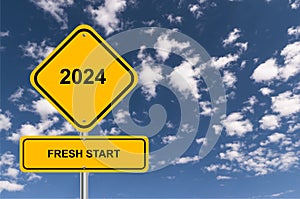 2024 fresh start traffic sign on blue sky