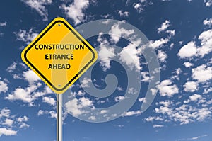 construction etrance ahead traffic sign on blue sky