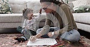 Homework, drawing or father teaching kid for education, playing or bonding together for child development. Family