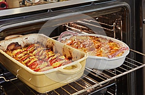 Homey Oven Creations, Freshly Baked Pie and Potatoes in Ceramic Dishes. Savoring Comfort, Baked Pie and Potatoes in