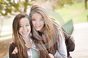 Homosexual Couple Poses for a Portrait Outside