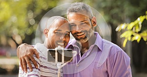 Homosexual Gay Couple Men Taking Selfie With Smartphone photo