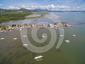 Honda Bay and Sta. Lourdes Wharf in Puerto Princesa, Palawan, Philippines. Beautiful Landscape with Low Tide Sulu Sea photo