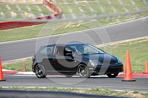 Honda Civic Si driving on Race Course