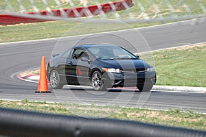 Honda Civic Si driving on Race Course