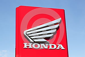 Honda motorcycle logo on a panel