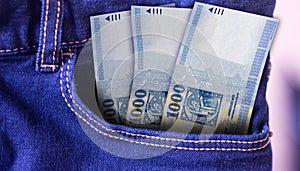 Honduras 100 Lempira Banknotes in Pocket of Jeans