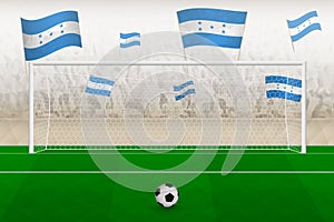 Honduras football team fans with flags of Honduras cheering on stadium, penalty kick concept in a soccer match