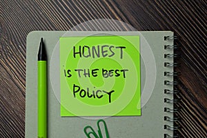 Honest Is The Best Policy write on sticky notes isolated on office desk