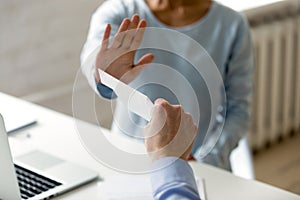 Honest company worker rejecting corrupting and bribery at workplace. photo