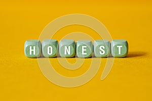 Honest - word concept on building blocks, text