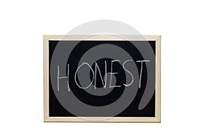 HONEST written with white chalk on blackboard