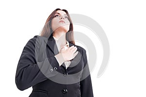 Honesty, patriotism and devotion gesture made by young woman photo