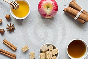 Honey and Apple, brown sugar and anise with cinnamon on a light background copy space for text.