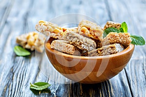 Honey bars with peanuts, sesame seeds and sunflower seeds.