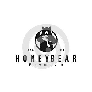 Honey bear with bee hive logo vector design illustration with a drop of honey icon mascot silhouette . retro vintage symbol emblem