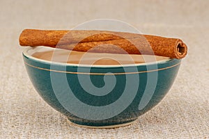 Honey in bowl with cinnamon