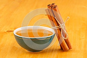 Honey in bowl and cinnamon