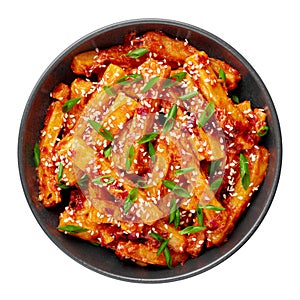 Honey Chilli Potato or Schezwan Aloo in black bowl isolated on white. Chilli Potatoes is indo-chinese cuisine dish