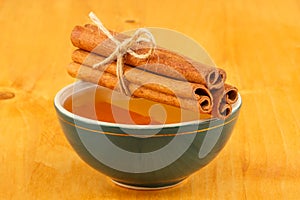 Honey and cinnamon in bowl