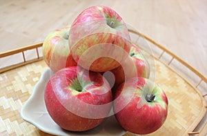 Honey crisp apples on a wooden table