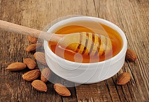 Honey dipper with almonds